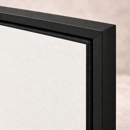 Construction close-up showing black canvas wrap, narrow recessed gap and a separate black floating frame level with the canvas face